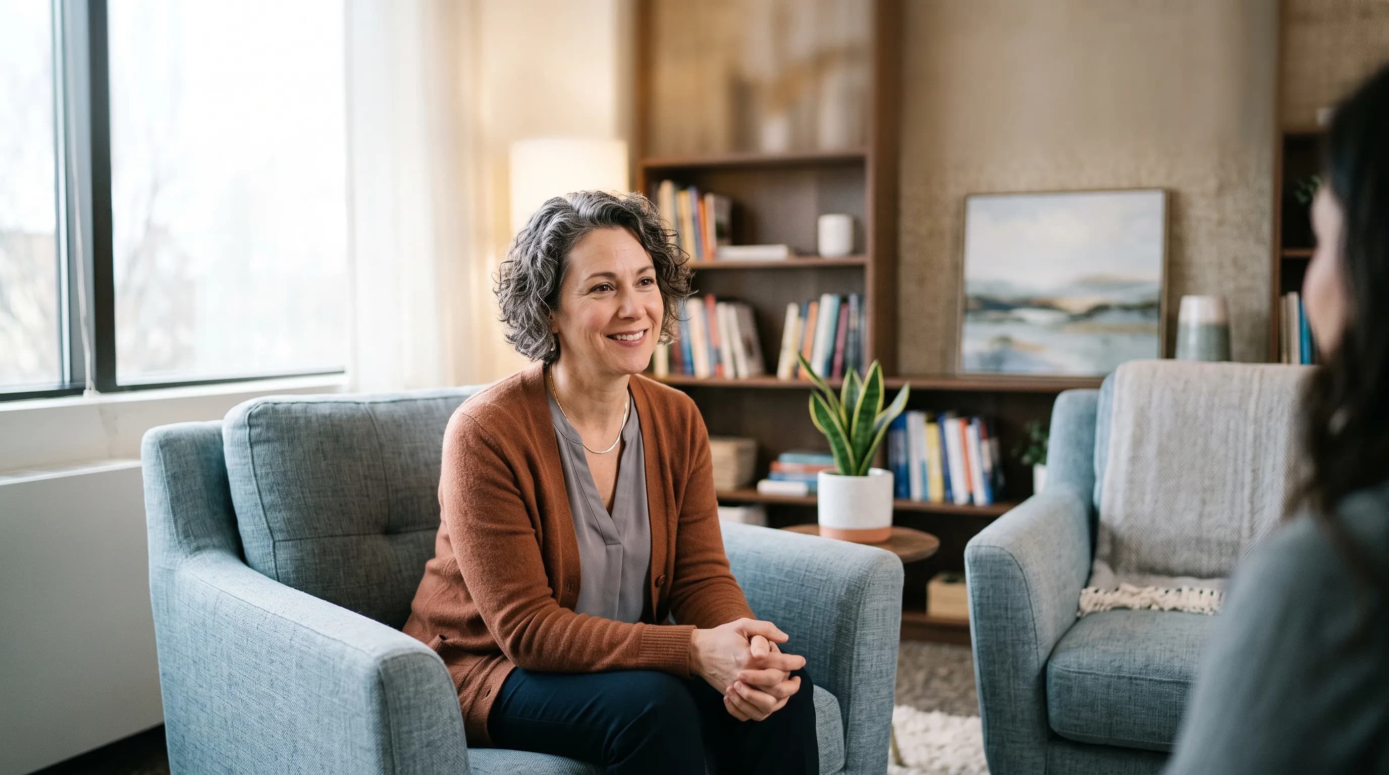 A mental health counselor in a session setting
